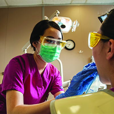 Nurse with patient in office